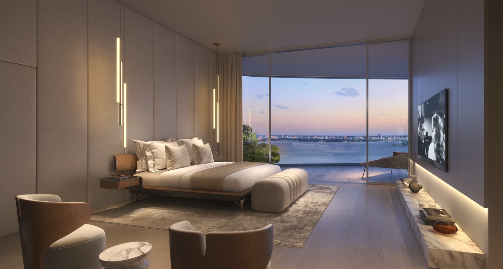 Primary bedroom suite with walk-in closets, Pagani Arte custom finishes, and bay views.
