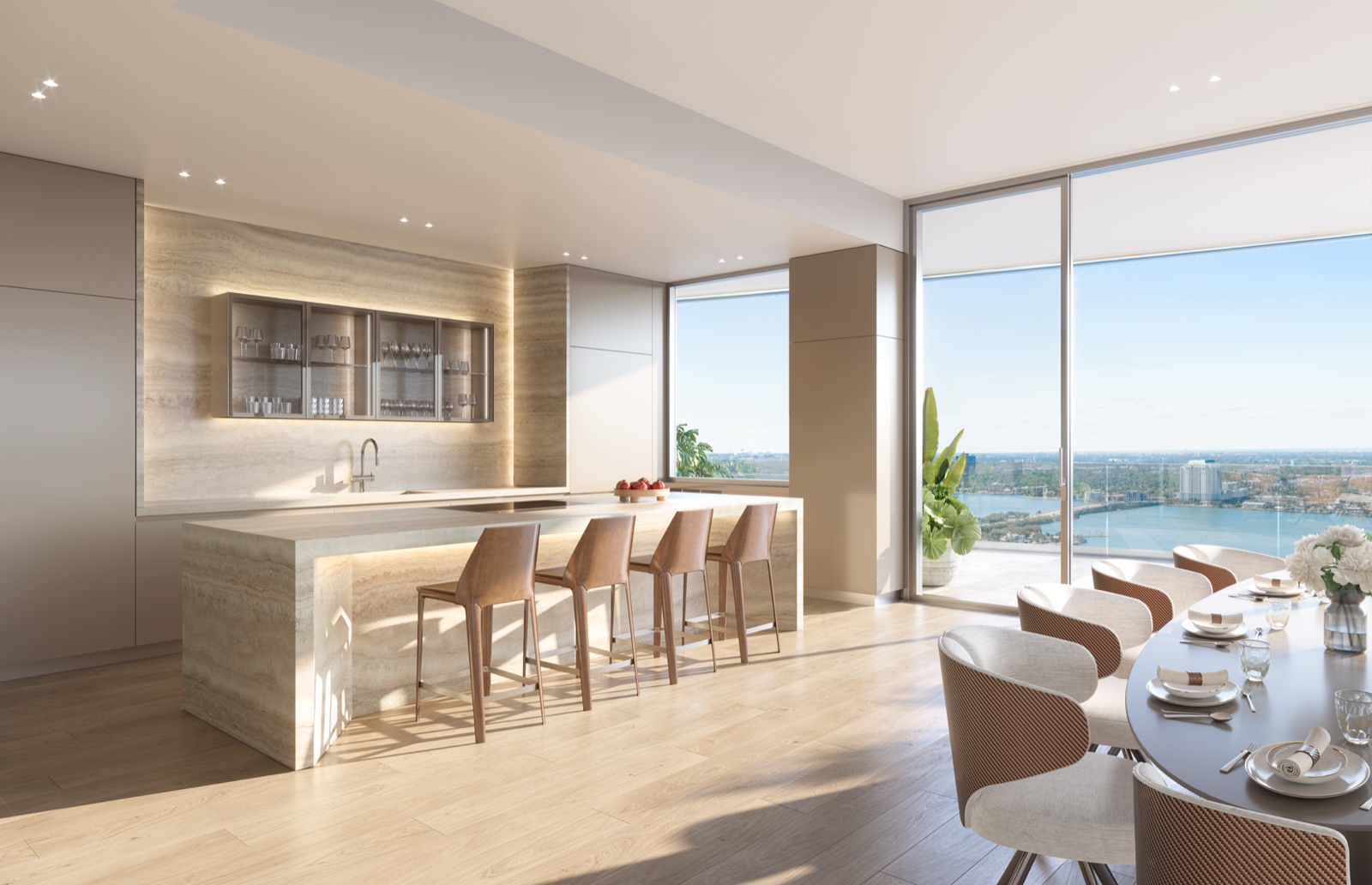 Schiffini kitchen with 16-foot island, comprehensive Gaggenau appliance package, travertine countertops.
